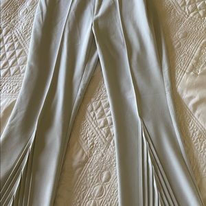Flare pleated leg pant in celery colored